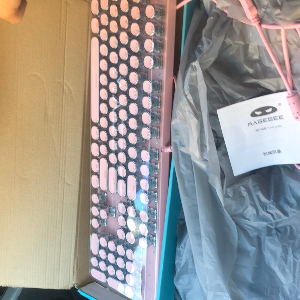 Mechanical pink Mk-Storm keyboard.